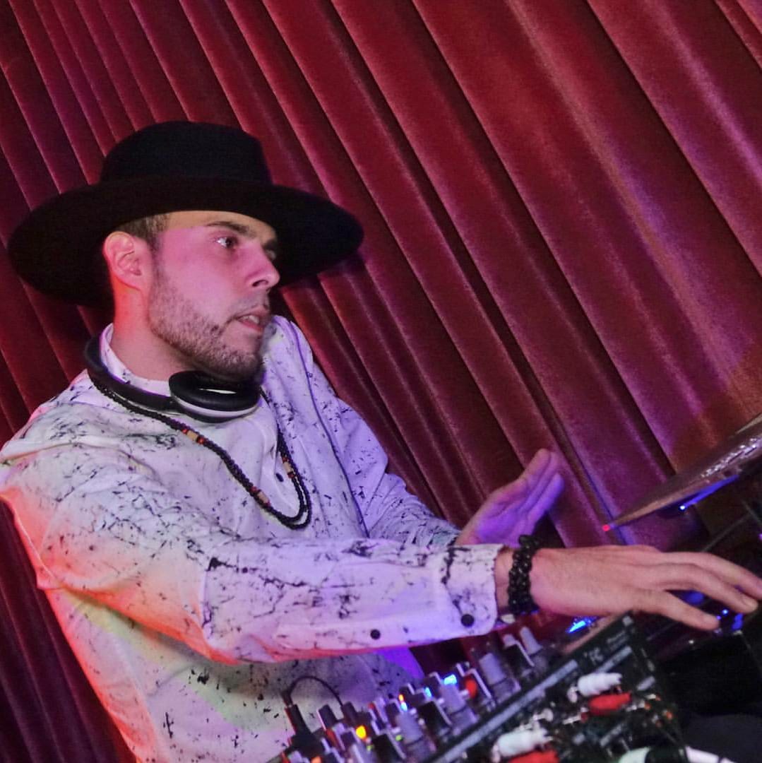 DJ LexNY performing at a club
